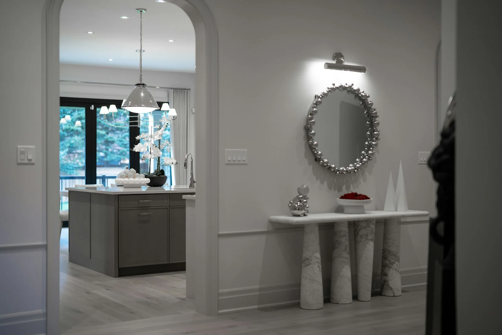 Modern entryway with slim console and mirror