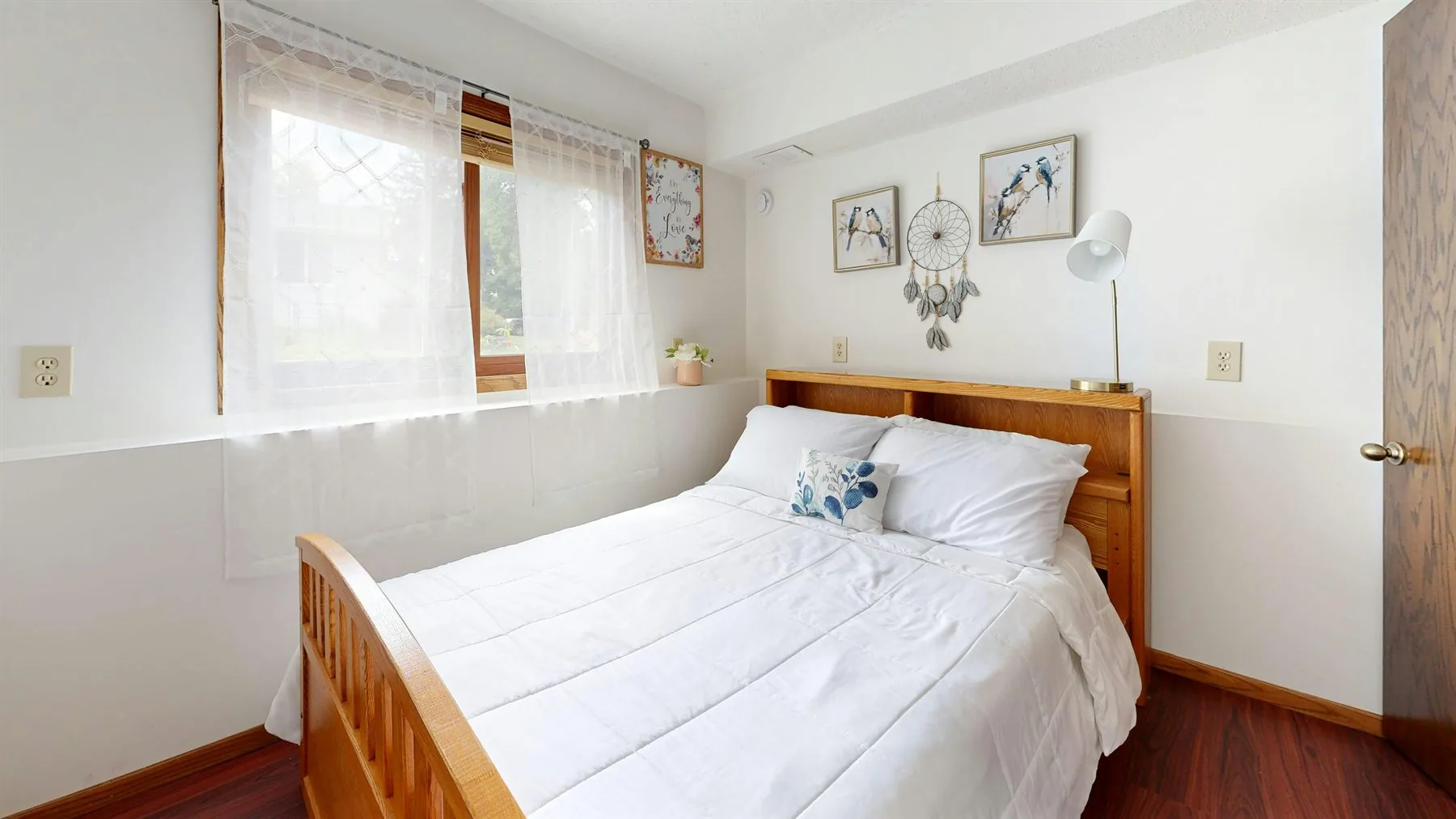 Bedroom with simple wood furniture and a calmer natural palette