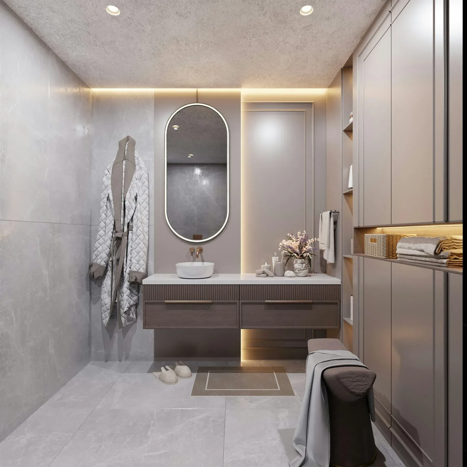 Warm bathroom with muted stone surfaces, soft lighting, and a calm neutral palette