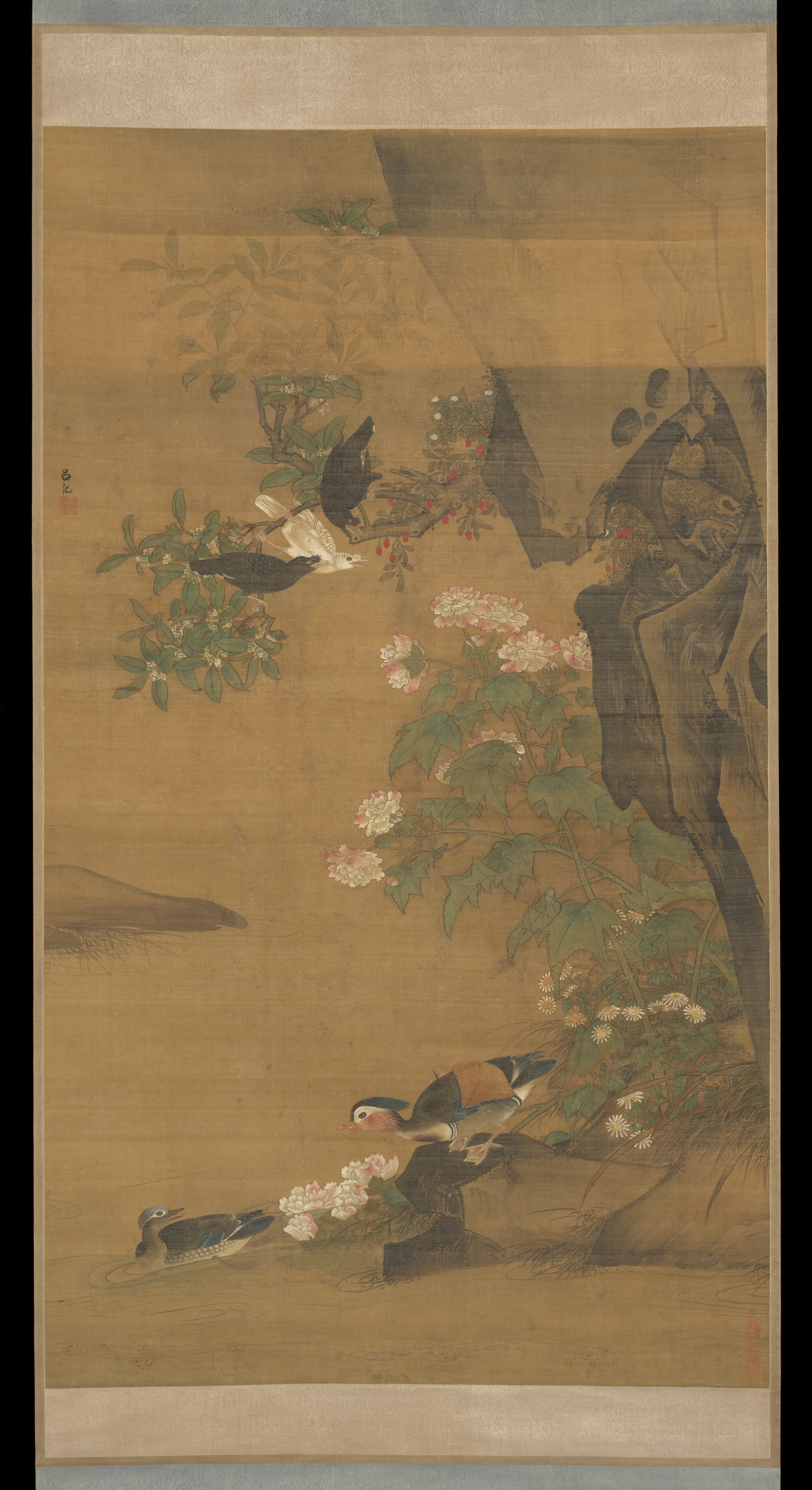 Lü Ji's painting with paired mandarin ducks among flowering plants and rocks