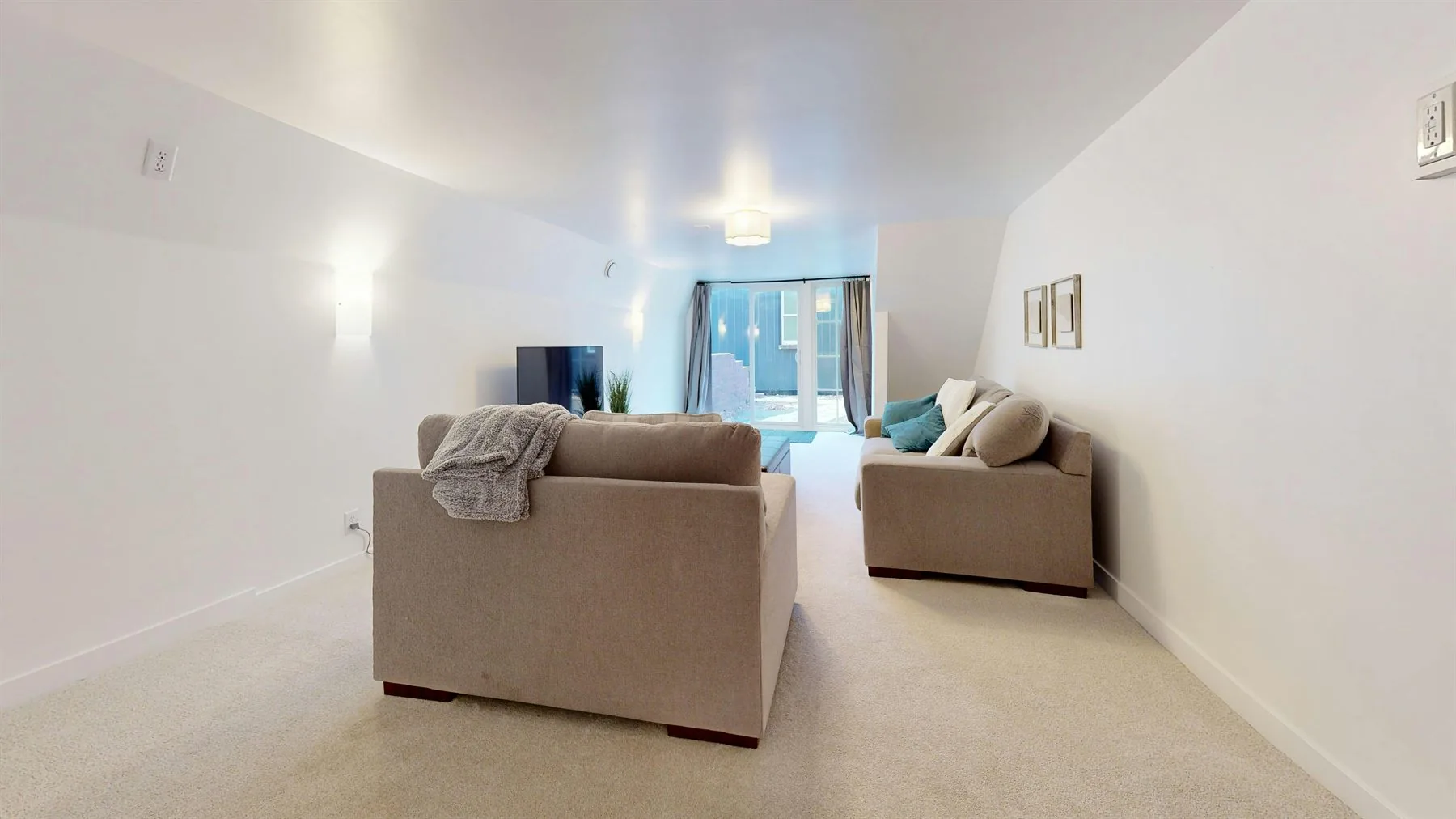 Connected home interior with soft neutral walls and a calm room-to-room palette