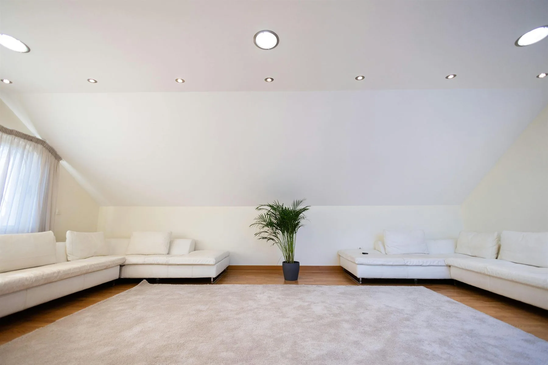 White room with soft black accents and clean minimal styling