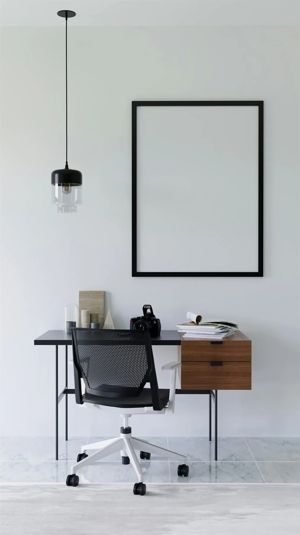Minimal office with white walls, black chair, and a walnut desk drawer